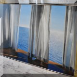 A13. Framed ocean photo. 35”h x 57”w 